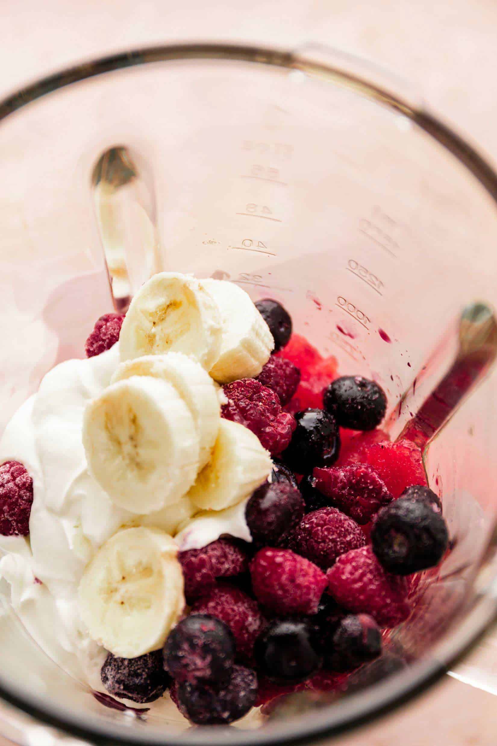 watermelon smoothie ingredients in a blender.