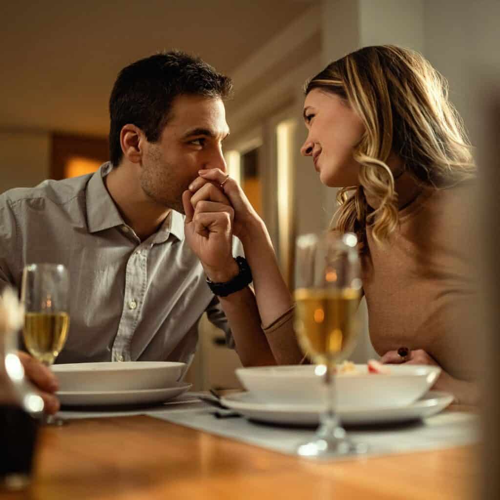 Couple enjoying dinner together at a restaurant during a date.
