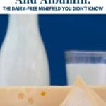 A milk bottle and glass behind assorted cheeses against a blue background. Text reads "Casein, Rennet And Albumin: The Dairy-Free Minefield You Didn’t Know."