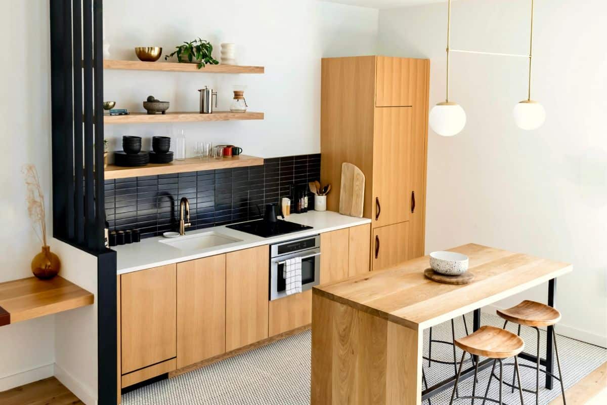 Modern rental kitchen with dining table and cooking area